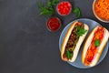 Different tasty homemade hot dogs with tomato Royalty Free Stock Photo