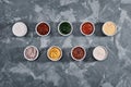 Different tasty sauces in bowls, various sauces on gray stone background, top view Royalty Free Stock Photo