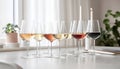 Different tasty wines in glasses on table indoors, selective focus Royalty Free Stock Photo