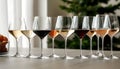 Different tasty wines in glasses on table indoors, selective focus Royalty Free Stock Photo