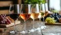 Different tasty wines in glasses on table indoors, selective focus Royalty Free Stock Photo