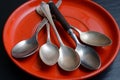 Different teaspoons on a plate Royalty Free Stock Photo
