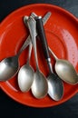 Different teaspoons on a plate Royalty Free Stock Photo