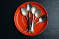 Different teaspoons on a plate Royalty Free Stock Photo