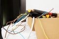 Different tools and cables in paper indoors. Installation of electrical wiring Royalty Free Stock Photo