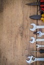 Different tools supplies on a wooden background