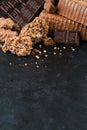Different type of chocolate pieces over black background with co Royalty Free Stock Photo