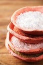 Different type of salt in rustic clay bowls Royalty Free Stock Photo