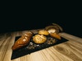 Different types of bread on a slate board Royalty Free Stock Photo