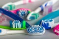 Different types of bright beautiful colorful toothbrushes