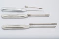 Different types of catheter trocars on grey surface Royalty Free Stock Photo