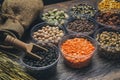 Different types of cereal beans that have a variety of nutritional benefits on the wooden floor