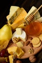 Different types of cheeses on a blackboard Royalty Free Stock Photo