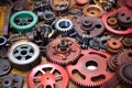 different types of cogs and wheels on a workshop bench