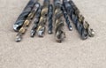 Different Types of Drill Bits. Old and worn-out drill bits in various sizes Royalty Free Stock Photo