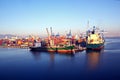 Different types of dry cargo, passenger and container vessels in motion and moored at the port of Izmir, Turkey. Royalty Free Stock Photo