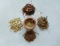 different types of dry tea, in the middle of a calabas with mate . Tea party concept Royalty Free Stock Photo