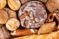 different types of freshly baked bread, baguette, pretzel, etc ... top view, close-up Royalty Free Stock Photo