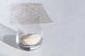 Different types of gelatin powder and sheets on white table Royalty Free Stock Photo