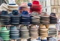 Different types of hats on display for sale at the market Royalty Free Stock Photo