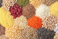 Different types of legumes and cereals as background. Organic grains Royalty Free Stock Photo