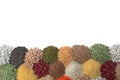 Different types of legumes and cereals on background, top view. Organic grains Royalty Free Stock Photo