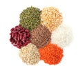 Different types of legumes and cereals on white, top view. Organic grains Royalty Free Stock Photo