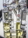 Different types of medical vials on a tray in a laboratory