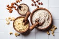 Different types of nut flour - almond, hazelnut and cashew, white background. Keto diet and gluten free concept Royalty Free Stock Photo