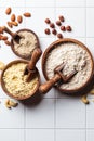 Different types of nut flour - almond, hazelnut and cashew, white background. Keto diet and gluten free concept Royalty Free Stock Photo