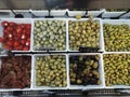 Different types of olives and chillies Royalty Free Stock Photo