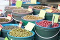 Different types of olives on display at market. Royalty Free Stock Photo