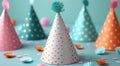 different types of paper party hats lying on top of table Royalty Free Stock Photo