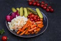 Different types of pickled vegetables on a dark background Royalty Free Stock Photo