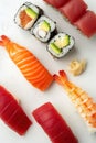 Different types of preparation for salmon, bluefin tuna, and avocado sushi