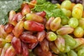 Different types of ripe sweet grapes, closeup