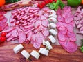 Different types of salami slices and bacon