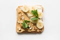 Different types of sandwiches for healthy and sugar-free children`s breakfast, nut paste, bananas