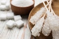 Different types of sugar on white wooden table, closeup Royalty Free Stock Photo