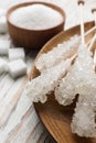 Different types of sugar on white wooden table, closeup Royalty Free Stock Photo