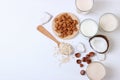 Different types of vegetable milk on the table.