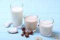 Different types of vegetable milk on the table.