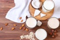 Different types of vegetable milk on the table.