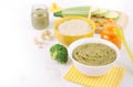 Different types of vegetable puree on the light background near ingredients Royalty Free Stock Photo
