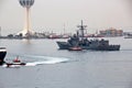 Different types of vessels calling at the port and standing at the pier. Tugboats at the port. Jeddah Port, Saudi Arabia.