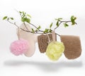 different types of washcloths hanging on a birch branch. levitating washcloth of various materials. bath and wellness Royalty Free Stock Photo