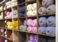 Different types of yarn on the shelves in the store Royalty Free Stock Photo
