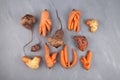 Different Ugly vegetables potato; carrot; beetroot on grey textured background, top view. Concept - Using in cooking imperfect