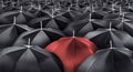 Different, unique and standing out of the crowd red umbrella Royalty Free Stock Photo