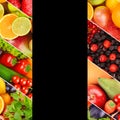 Different useful fruits and vegetables isolated on black . Free space for text Royalty Free Stock Photo